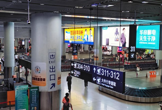西安咸陽機(jī)場到達(dá)行李廳高空燈箱廣告投放，西安機(jī)場廣告價格